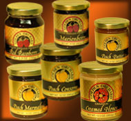 select 6 jars of Golden Orchard preserves, honeys and other products